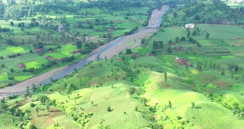 Green Hills Like Windows Wallpaper With Clouds and Village Fields Stock-Footage 154861589