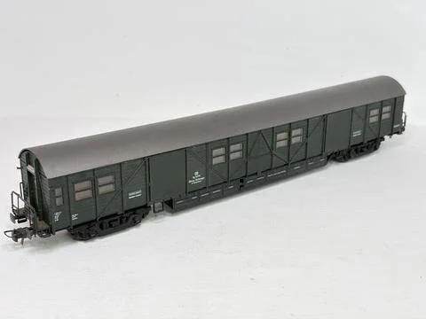 Green HO scale model railway baggage wagon made in Austria. Stock Photos