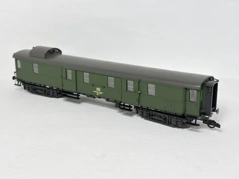Green HO scale model railway baggage wagon made in Austria. Stock Photos
