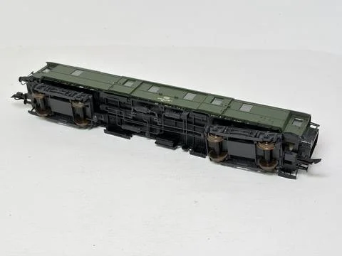 Green HO scale model railway baggage wagon made in Austria. Stock Photos