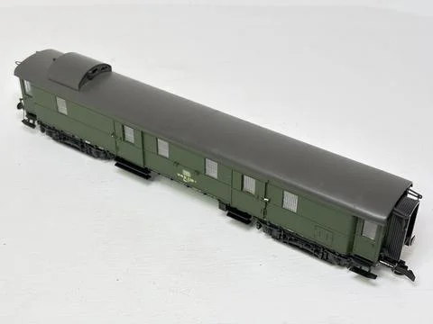 Green HO scale model railway baggage wagon made in Austria. Stock Photos