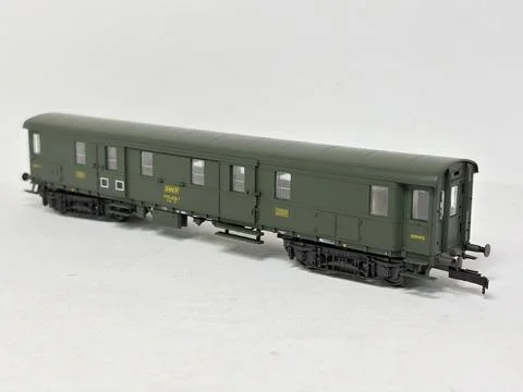 Green HO scale model railway baggage wagon made in Austria. Stock Photos