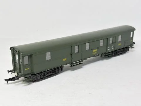 Green HO scale model railway baggage wagon made in Austria. Stock Photos