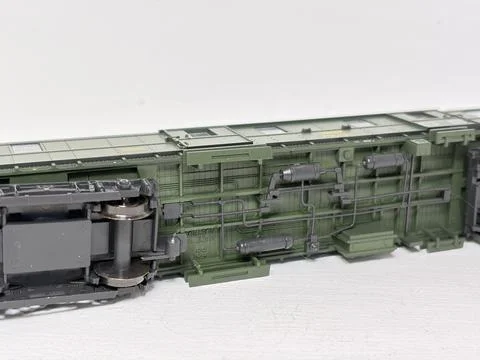 Green HO scale model railway baggage wagon made in Austria. Stock Photos