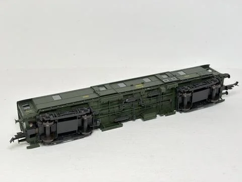 Green HO scale model railway baggage wagon made in Austria. Stock Photos