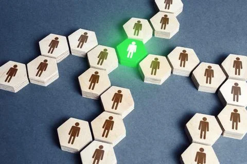 Green human figure is a connecting element of a network of people. A key esse Foto stock