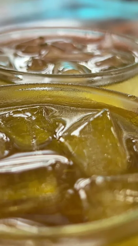 Green iced tea Ice cubes Fresh lemonade in wet glass with slice of lemon, mint Stock Footage 309258513