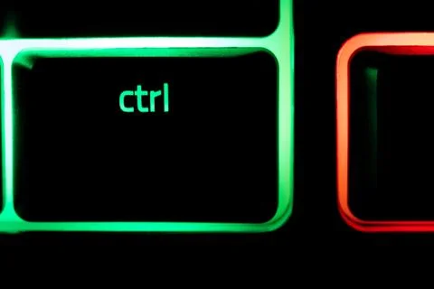 Green illuminated keyboard Ctrl control key closeup Foto stock