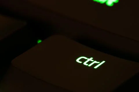 Green illuminated keyboard ctrl control key closeup Foto stock