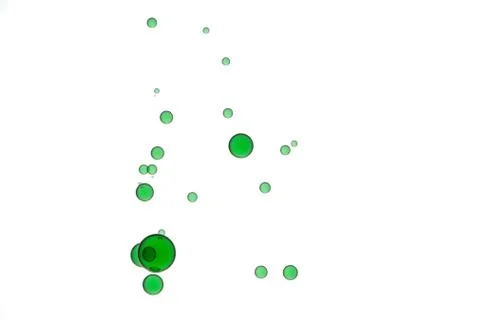 Green ink bubbles Stock Photos