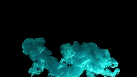 Green ink dropping in water creating abstract shapes footage background Stock Footage 327572410