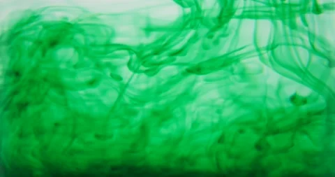 Green ink flow motion background isolated on white element Stock Footage 219239669