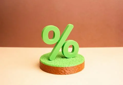 Green interest on a plot of land. Buying a plot of land with a mortgage. Inve Foto stock