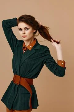 Green jacket red jacket makeup model belt Stock Photos