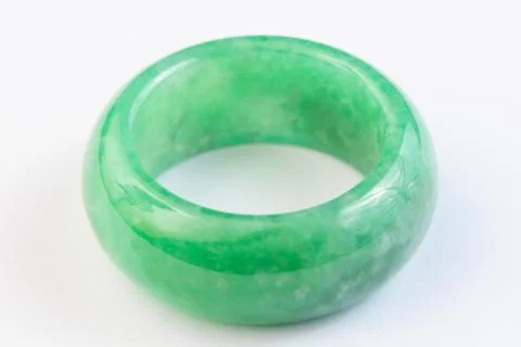 Green jade ring on white background Stock Photos