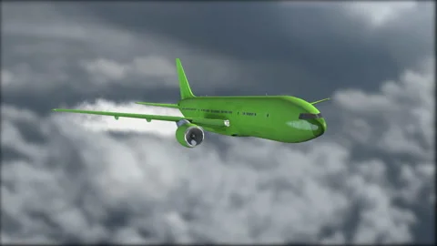 A green jetliner flying above the clouds. Blurred background. Airplane Stock Footage 146612733