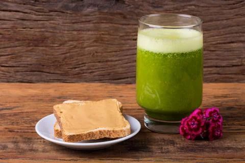 Green Juice and Toasts with Peanut Butter Stock Photos