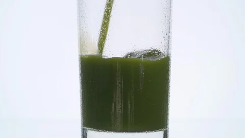 Green Juice Vertical Pour Stock Footage 107993694