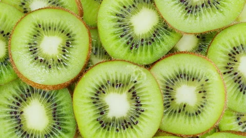 Green kiwi rotating top view, fresh and ripe sweet fruits circles. Healthy Stock Footage 170148369
