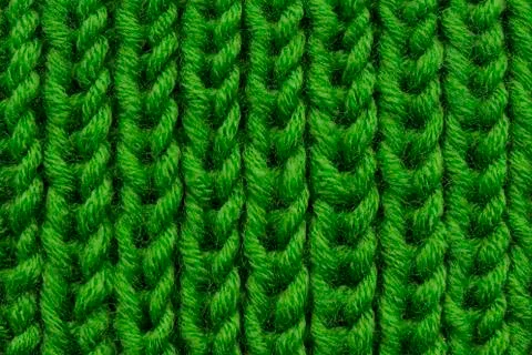 Green knitted texture close-up Stock Photos