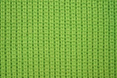 Green knitted texture, textile texture close up Stock Photos