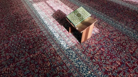 Green Koran in the Mosque on the table. 2 Video stock 76246692