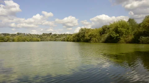 Green lake and clouds time lapse Stock Footage 46082177