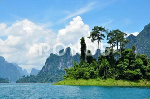 Green lake with perfect sky Stock Photos