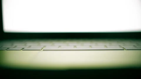 Green Laptop Keyboard With Blank Screen, Shallow Focus Dolly Shot Stock Footage 342347646