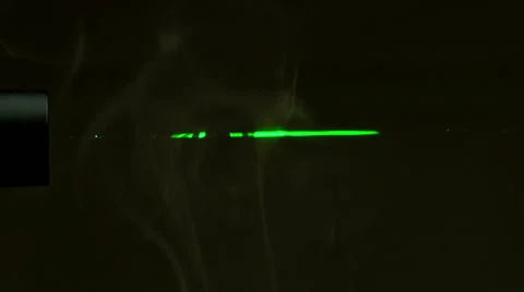 Green Laser Beam with a Smoke Stockbeeldmateriaal 47138450