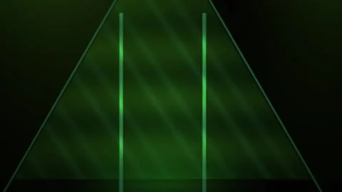 Green laser beams forming a triangle on a black background with white space. Stock Footage 336243480