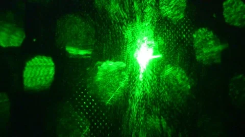 Green laser light glowing in the dark in the night club Stock Footage 104489296