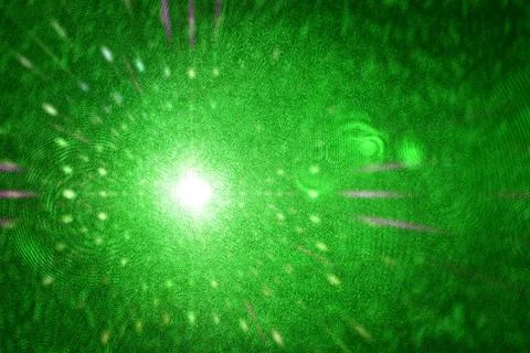 Green laser shining into camera  Stock Photos