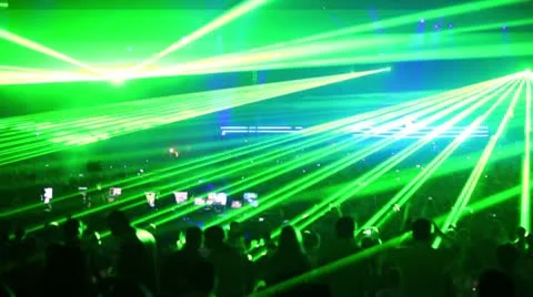 Green lasers rays above crowd, popular dutch DJ Armin Van Buuren on stage Stock Footage 10680396