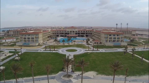 Green lawn in front of an empty hotel Stock Footage 126732616