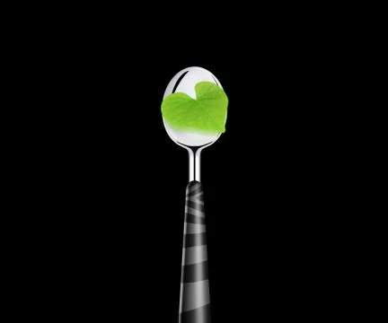 Green leaf and spoon Stock Photos