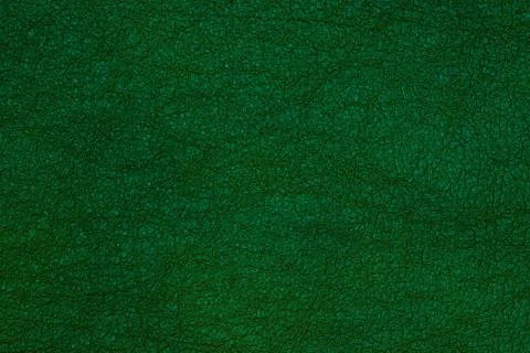 Green leather background texture closeup Stock Photos