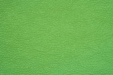 Green leather background texture closeup Stock-Fotos