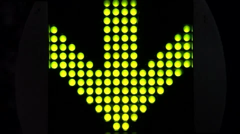 Green LED light arrow pointing down and moving fast downwards Stock Footage 56180997
