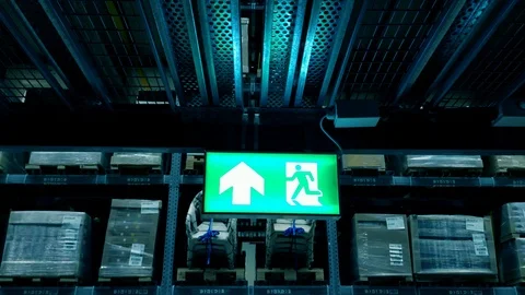 Green led light emergency exit sign (human running and arrow) Stock Footage 111070363
