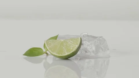 Green lemon lime with ice cube on white background 4k 스톡 동영상 75224785
