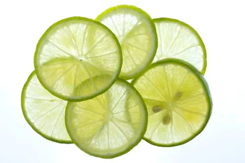 Green lemon slices thin pattern light . 库存照片