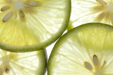 Green lemon slices thin pattern light Stock Photos