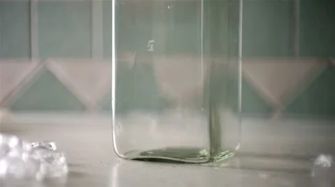 Green lemonade with ice cubes Stock Footage 8552398