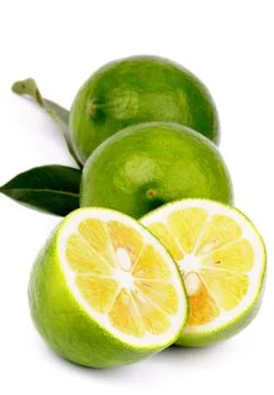 Green Lemons Stock Photos