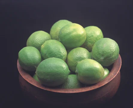 Green lemons Stock Photos