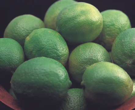 Green Lemons Stock Photos