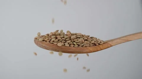 Green lentils slow motion Stock Footage 236450247