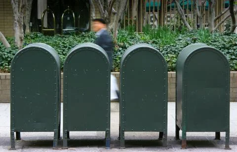 Green letterboxes Stock Photos