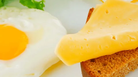 Green lettuce and fried eggs Stock Footage 35633120